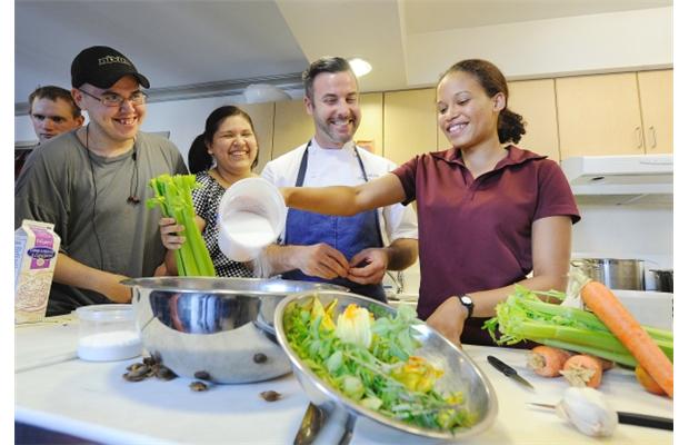 Chef Matt Stowe cooks with Covenant House youth