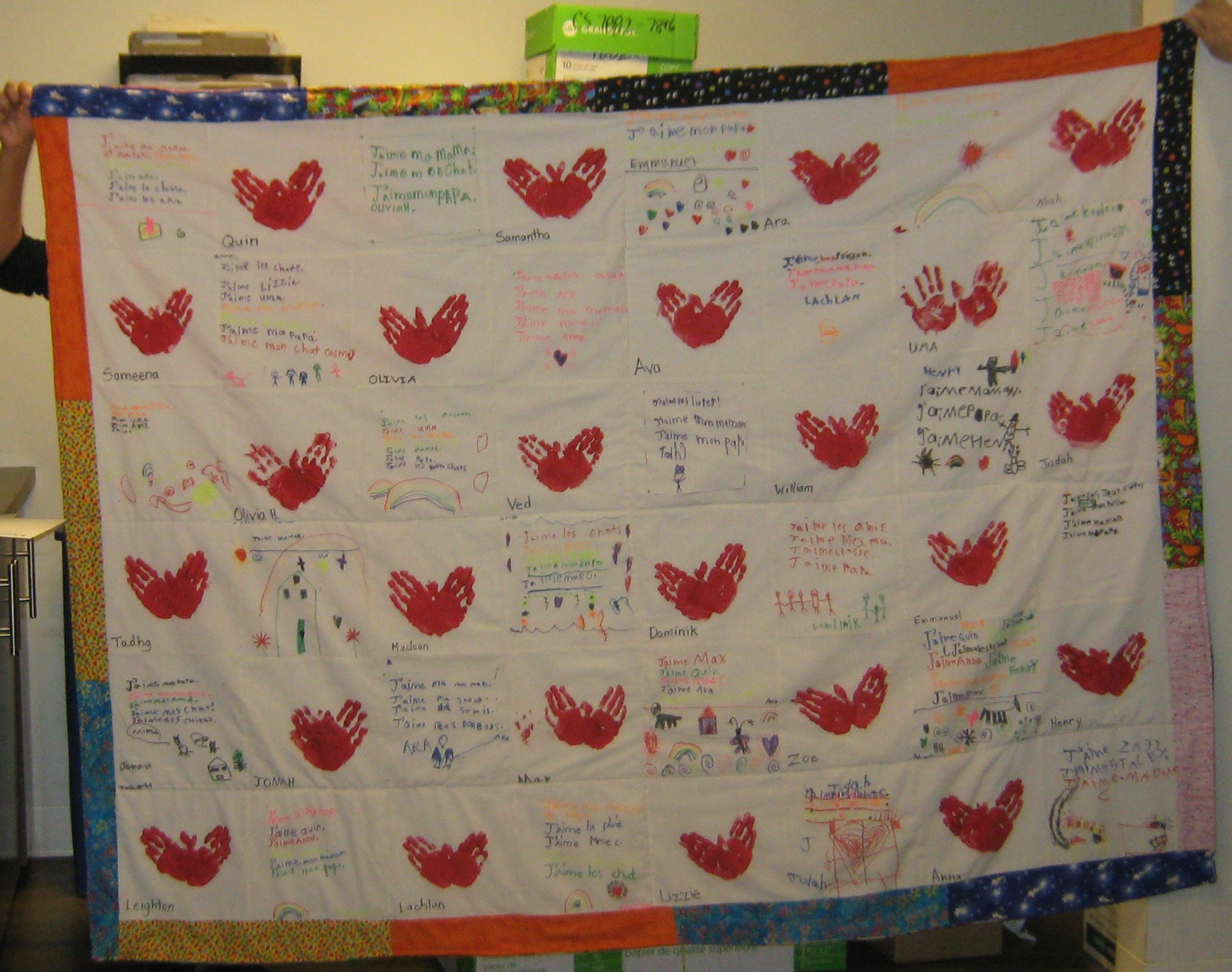Grade 1 class at École Bilingue donate handmade quilt for our youth