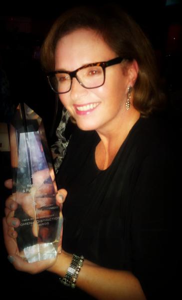 Krista Thompson wins YWCA Women of Distinction Award