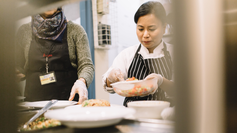 adding food to the plate